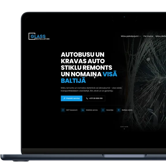 Glass Installation website shown on a laptop