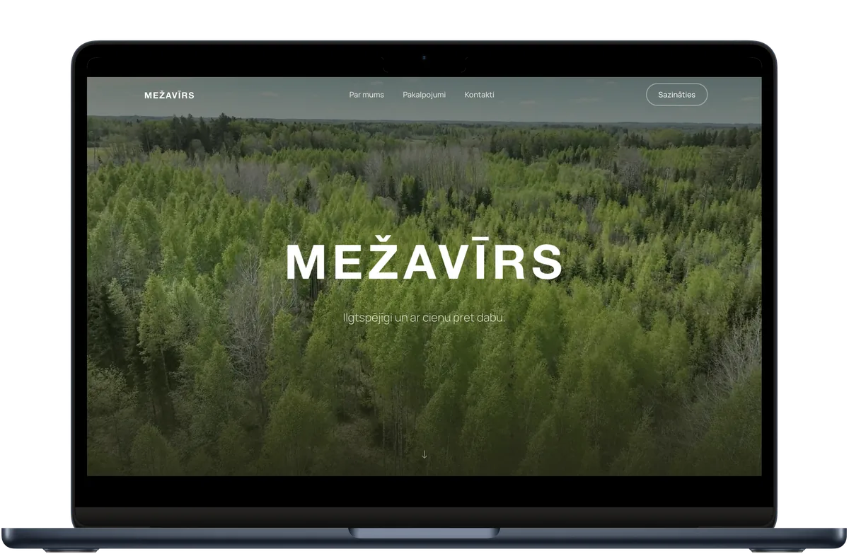 Mežavīrs website shown on a laptop