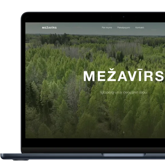 Mežavīrs website shown on a laptop