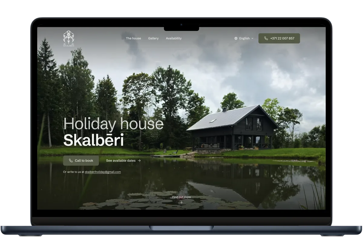 Skalbēri holiday house website shown on a laptop