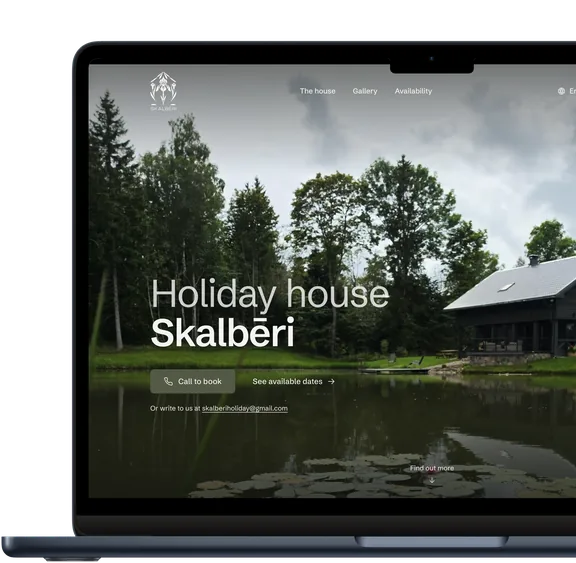 Skalbēri holiday house website shown on a laptop